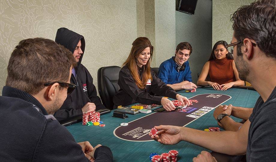 Poker players around table, Poker Tournaments, Daytona Beach Racing & Card Club